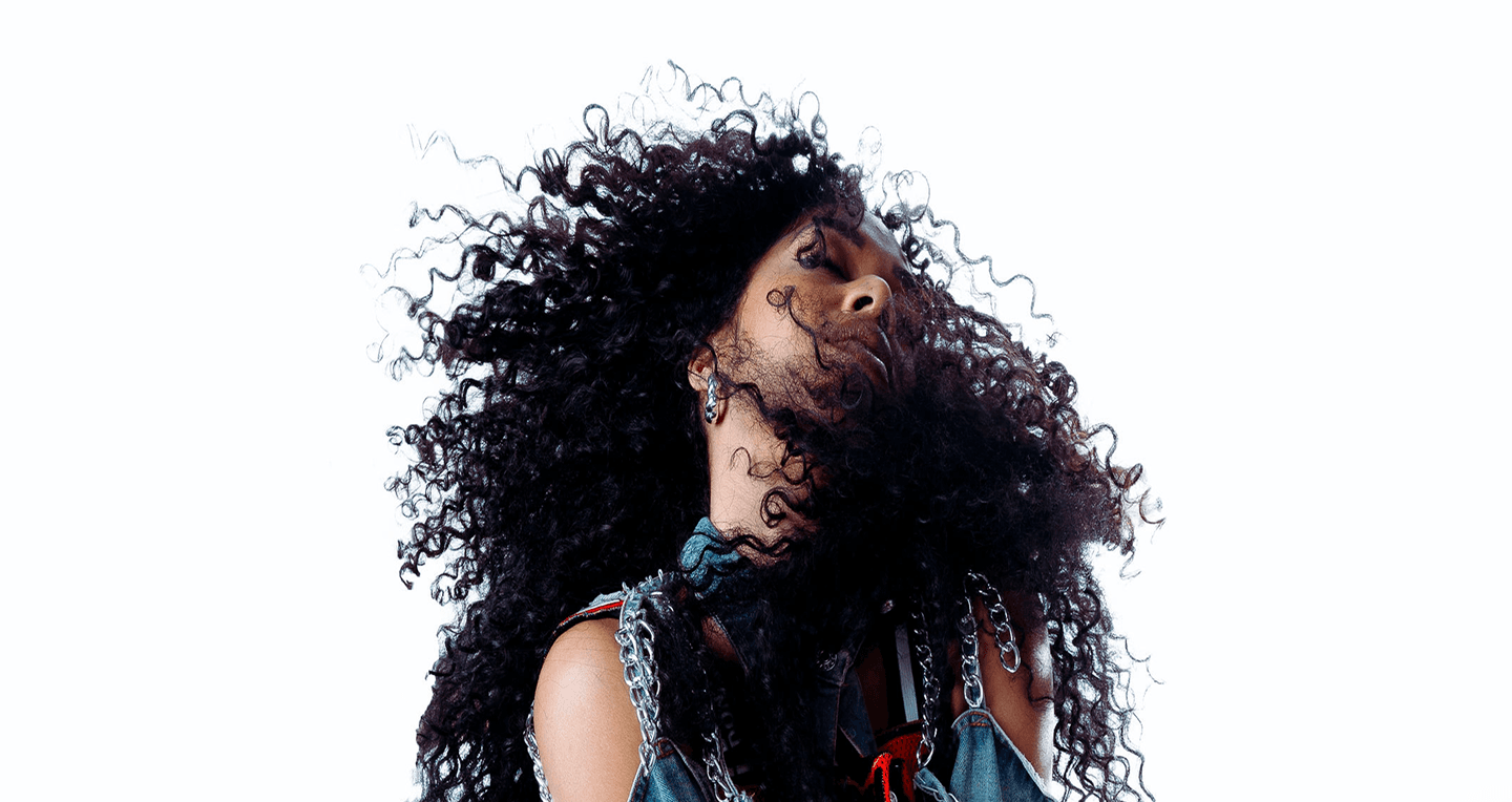 Dancer with flowing curly hair